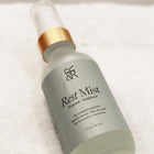 Close-up of The Rest Mist Limited Edition by Rest & Reset, highlighting minimalist packaging and refined wellness design