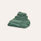 Ritual Bath Sheet Set by Rest & Reset shown folded in an alternate color, maintaining a refined minimalist aesthetic