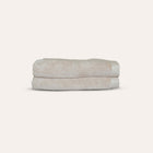 Oasis Bath Sheets Pair by Rest & Reset neatly folded, emphasizing premium organic cotton and clean design