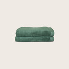 Oasis Bath Sheets Pair by Rest & Reset shown folded in an alternate color, maintaining a refined and modern aesthetic
