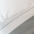 Close-up of organic cotton fabric from the Serene Duvet Cover Set by Rest & Reset, showing smooth and breathable weave