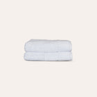 Ritual Hand Towels Pair by Rest & Reset folded in a lighter shade, showcasing softness and clean finishing