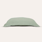 Murmur Pillow Sham by Rest & Reset displayed folded, highlighting clean lines and organic cotton softness
