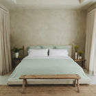 Murmur Quilt by Rest & Reset styled on a made bed from the front, creating a clean and inviting sleep space