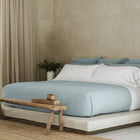 Murmur Euro Sham by Rest & Reset styled on a minimalist bed, adding depth and calm to the bedroom