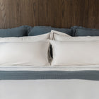 Murmur Euro Sham by Rest & Reset styled on a light-toned bed, supporting a calm and airy sleep space