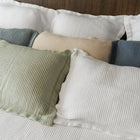 Murmur Euro Sham by Rest & Reset paired with matching bedding, creating a cohesive and restful look