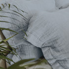 Veil Euro Sham by Rest & Reset styled in natural light, supporting a serene and mindful bedroom atmosphere