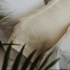 Close-up of organic cotton surface on Waves Euro Sham by Rest & Reset, emphasizing softness and relaxed structure