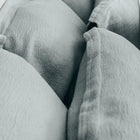 Close-up of organic cotton fabric on Waves Euro Sham by Rest & Reset, highlighting soft texture and dimensional weave