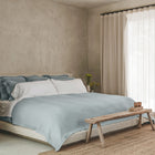 Waves Euro Sham by Rest & Reset styled on a minimalist bed, adding depth and calm to the bedroom