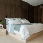 Organic cotton luxury bedding Waves Quilt styled neatly on a modern bed by Rest & Reset