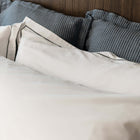 Serene organic cotton Euro sham by Rest & Reset styled on a full bed, designed for layered comfort and refined sleep spaces