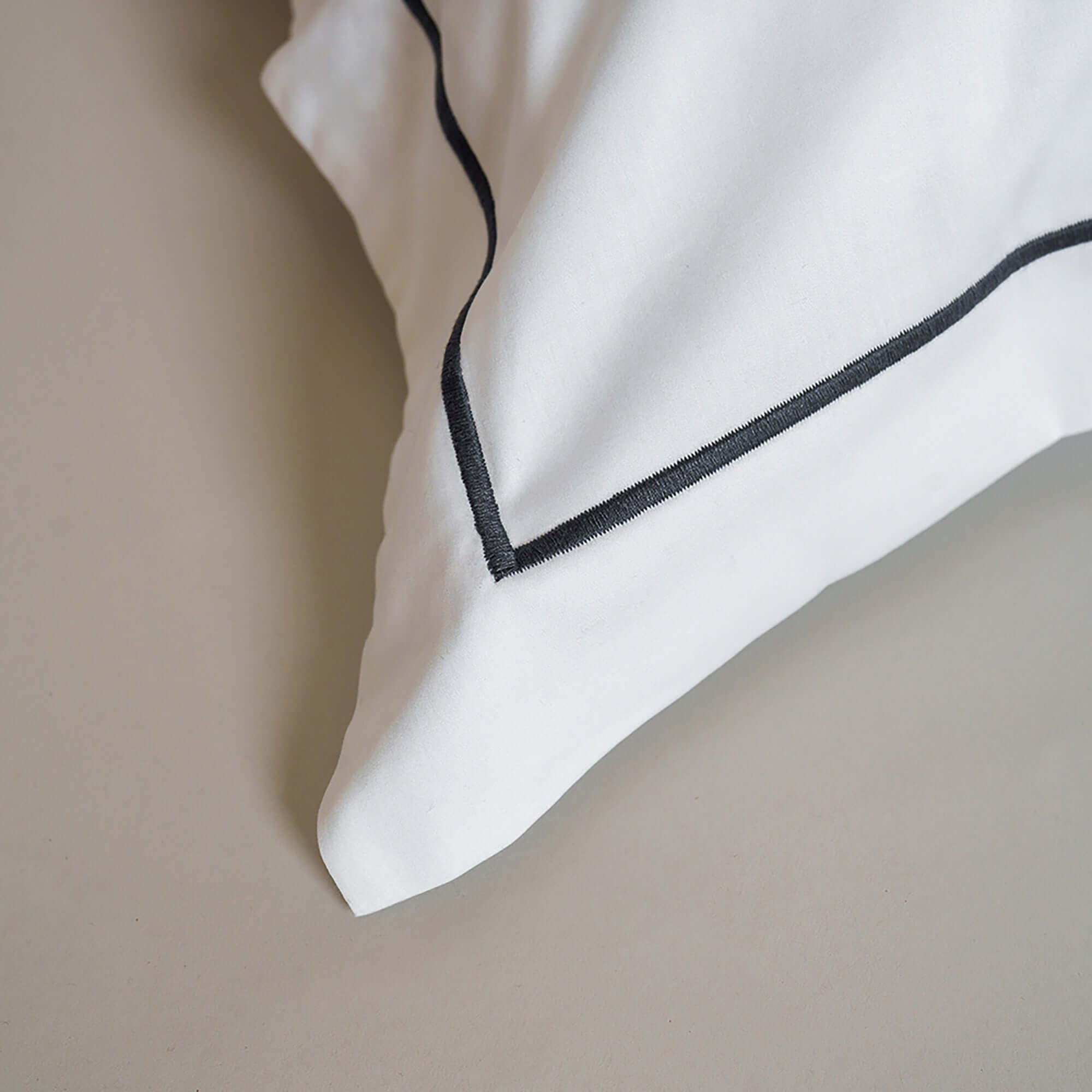 Close-up of the finished edge on Serene Euro Sham by Rest & Reset, showcasing clean design and premium fabric quality