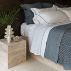 Close-up of folded edge on Serene Pillowcase by Rest & Reset, highlighting smooth organic cotton fabric and refined finish