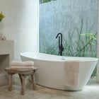 Ritual Bath Sheet Set by Rest & Reset styled near the bath, supporting relaxing and intentional self-care routines