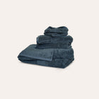 Ritual Bath Sheet Set by Rest & Reset folded in a darker shade, highlighting thickness and organic cotton quality