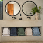 Ritual Bath Sheet Set by Rest & Reset styled near a window, creating a fresh and calming bathroom atmosphere