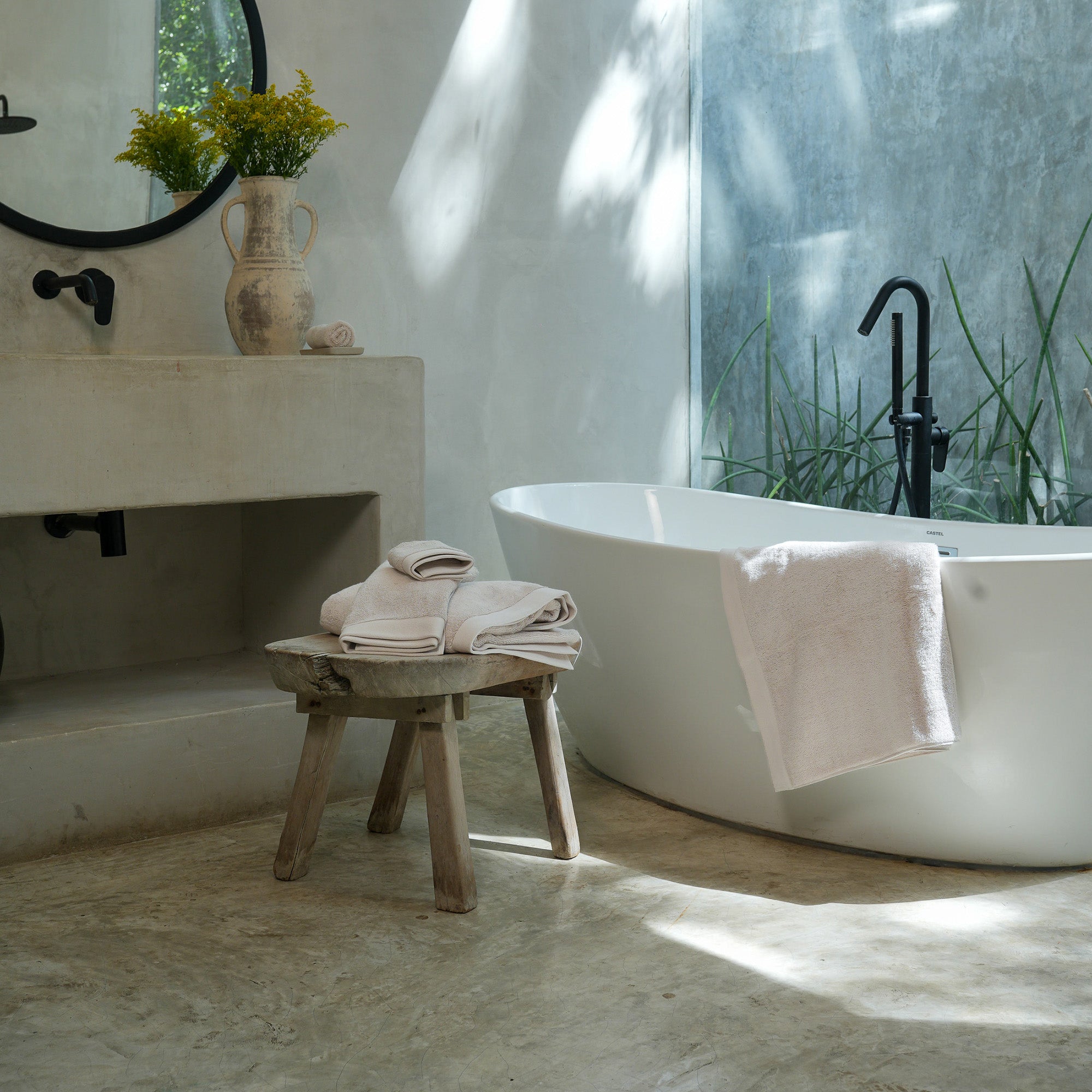 Oasis Bath Sheet Set by Rest & Reset styled in a serene bathroom, creating a calm and elevated bathing experience