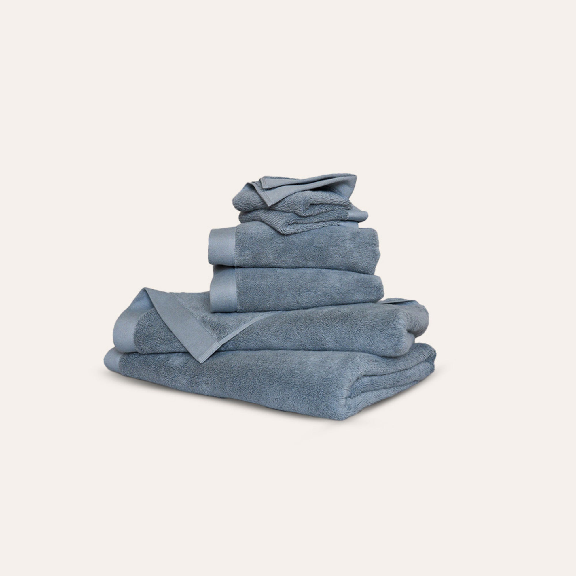 Oasis Bath Sheet Set by Rest & Reset stacked neatly, presenting plush bath sheets for spa-inspired living