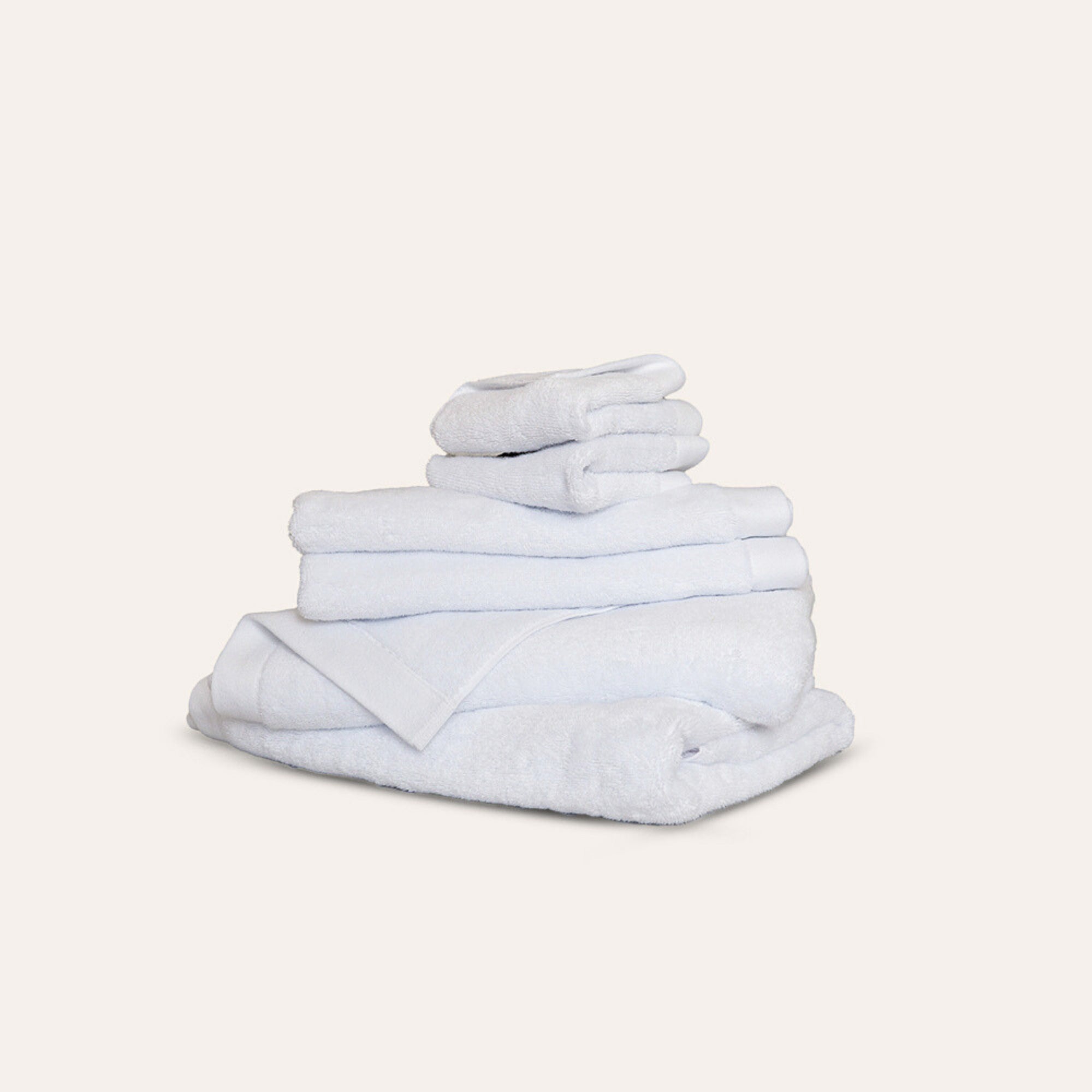 Oasis Bath Sheet Set by Rest & Reset folded in a lighter shade, showcasing softness and refined finishing