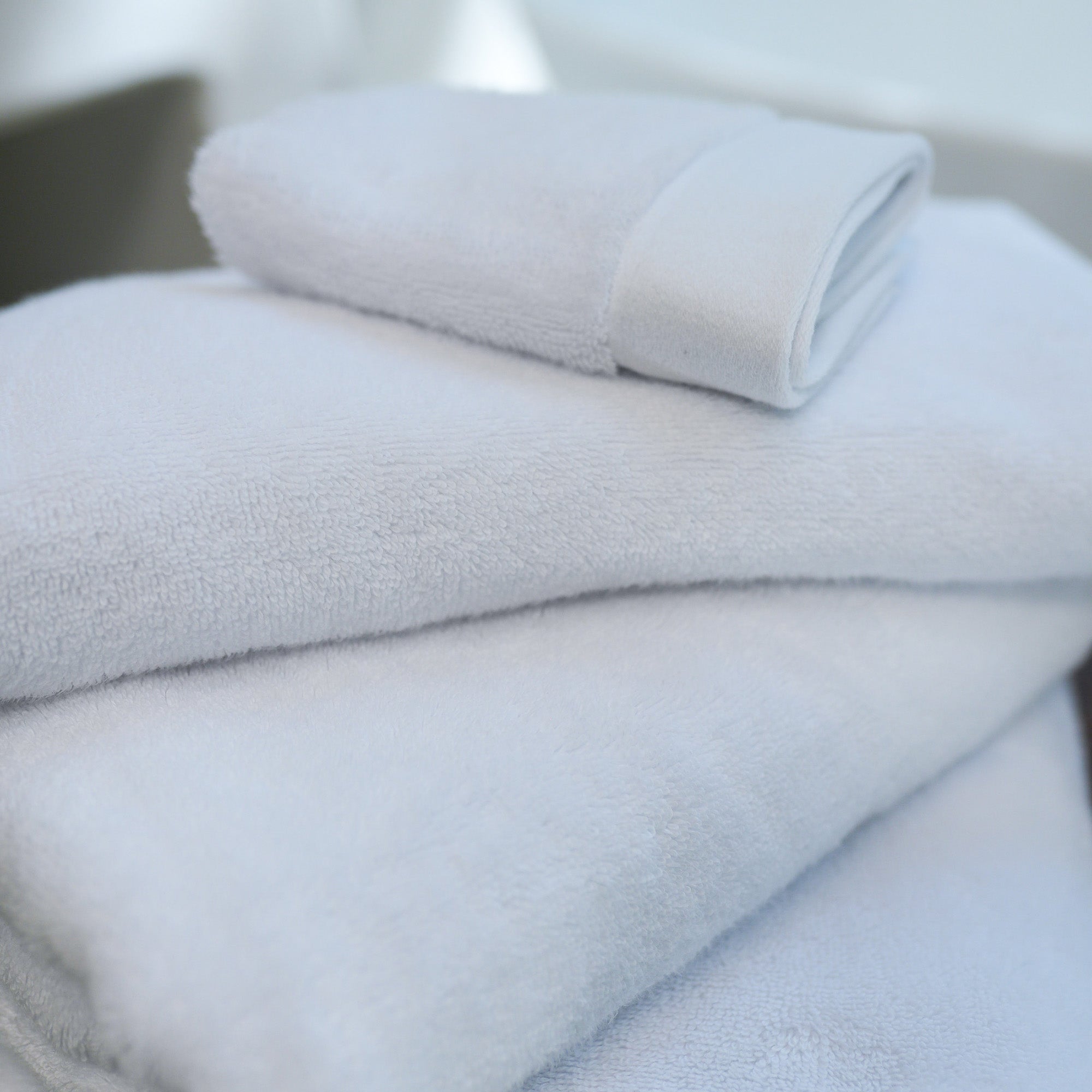 Close-up of folded edge on Oasis Bath Sheet Set by Rest & Reset, highlighting clean stitching and durability
