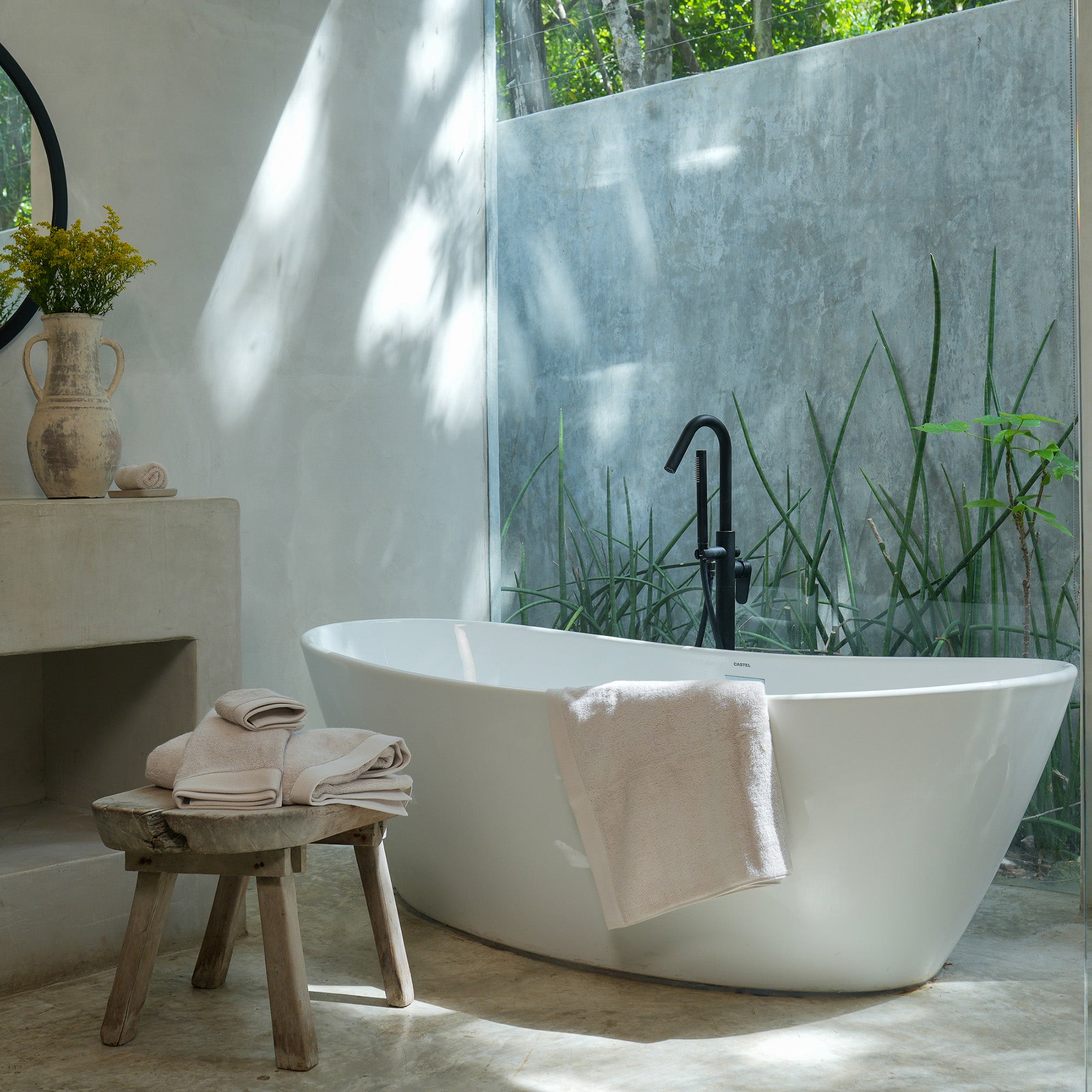 Oasis Bath Sheets Pair by Rest & Reset styled near the bath, supporting a spa-inspired daily ritual