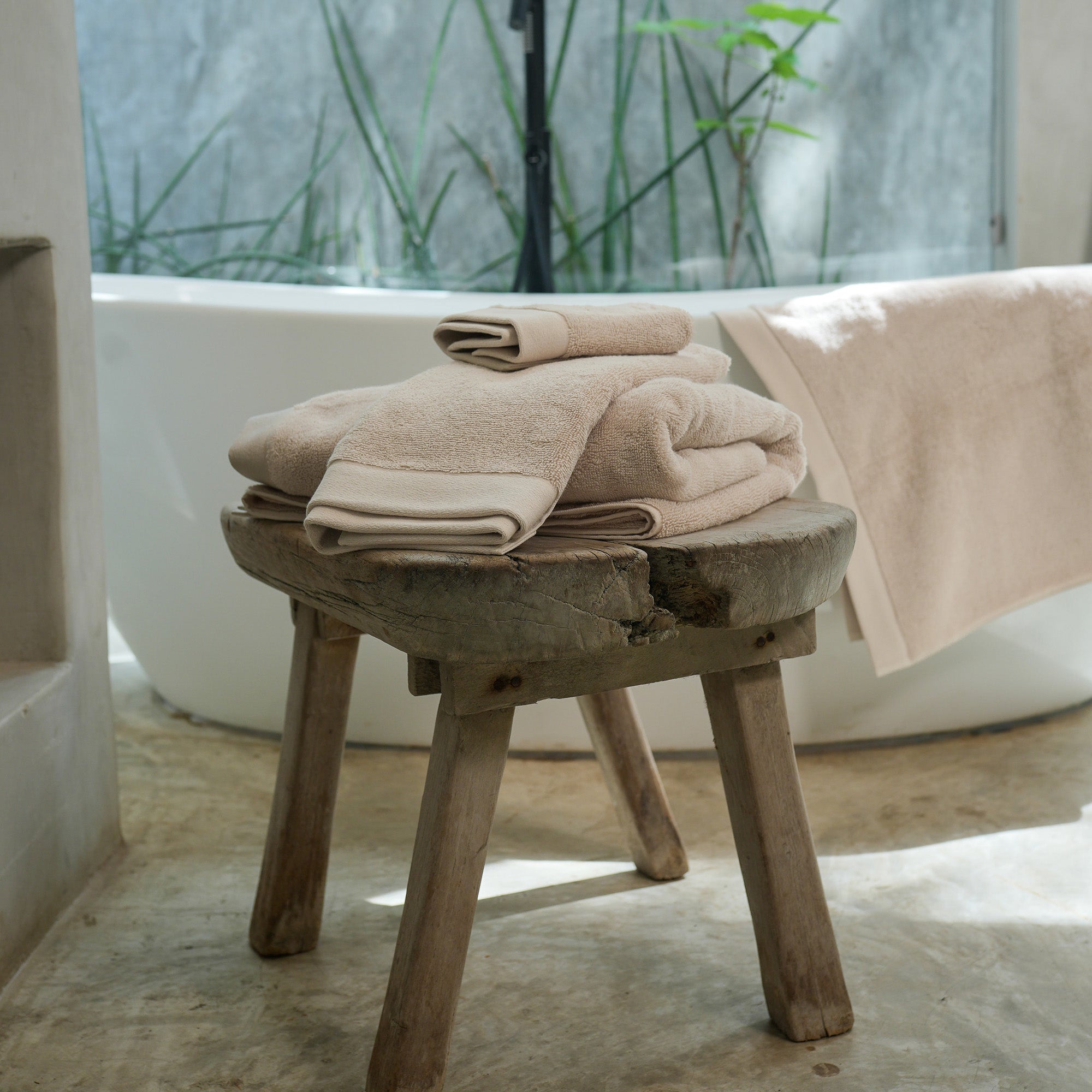 Oasis Bath Sheets Pair by Rest & Reset styled on a bathroom bench, adding softness and warmth to the space