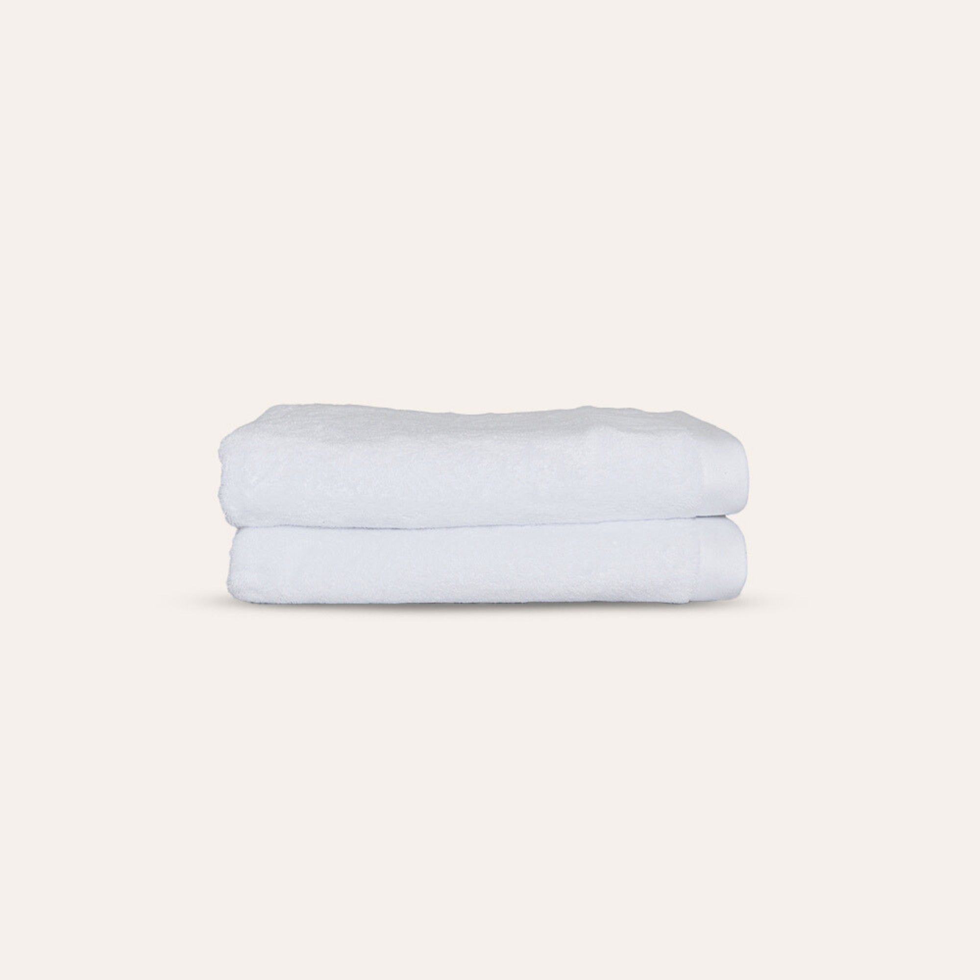 Oasis Bath Sheets Pair by Rest & Reset folded in a lighter shade, showcasing softness and refined texture