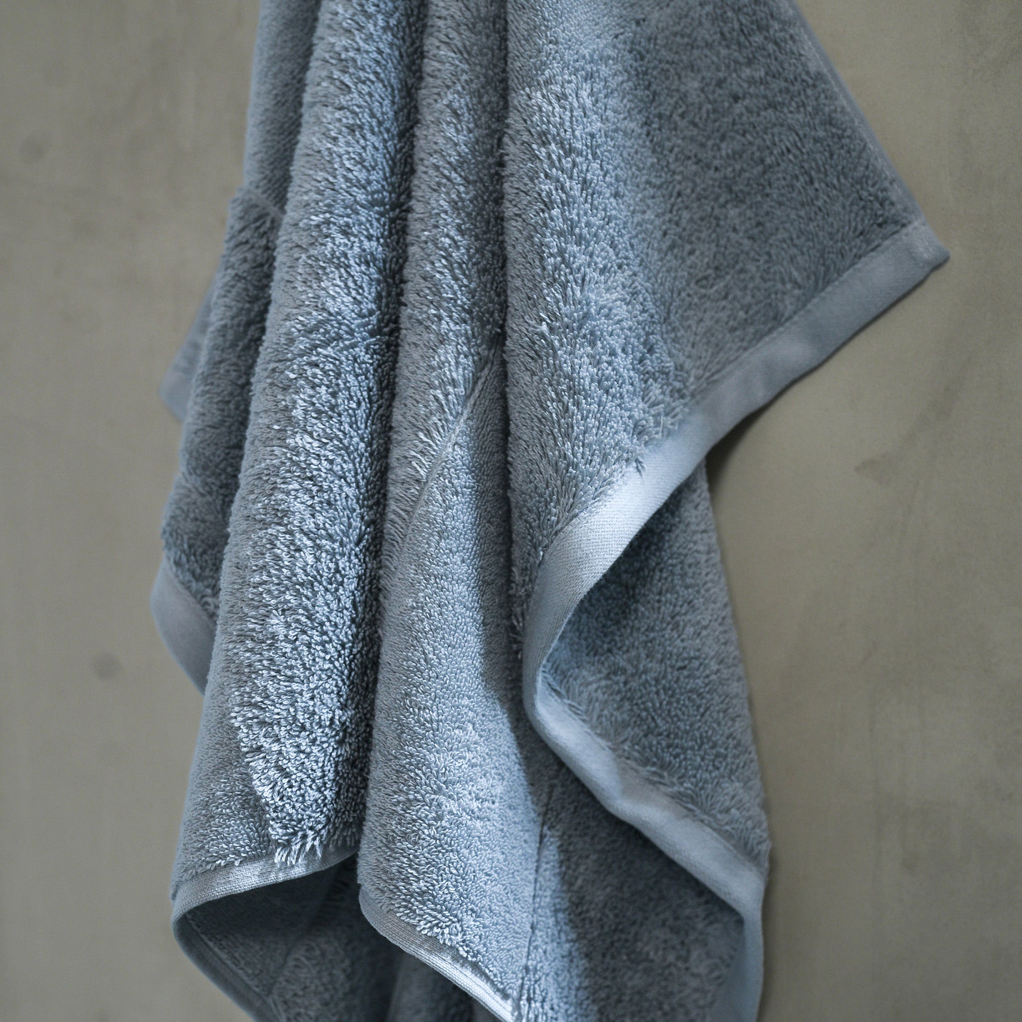 Close-up of organic cotton bath towels from the Ritual Bath Towels Pair by Rest & Reset, highlighting plush terry texture