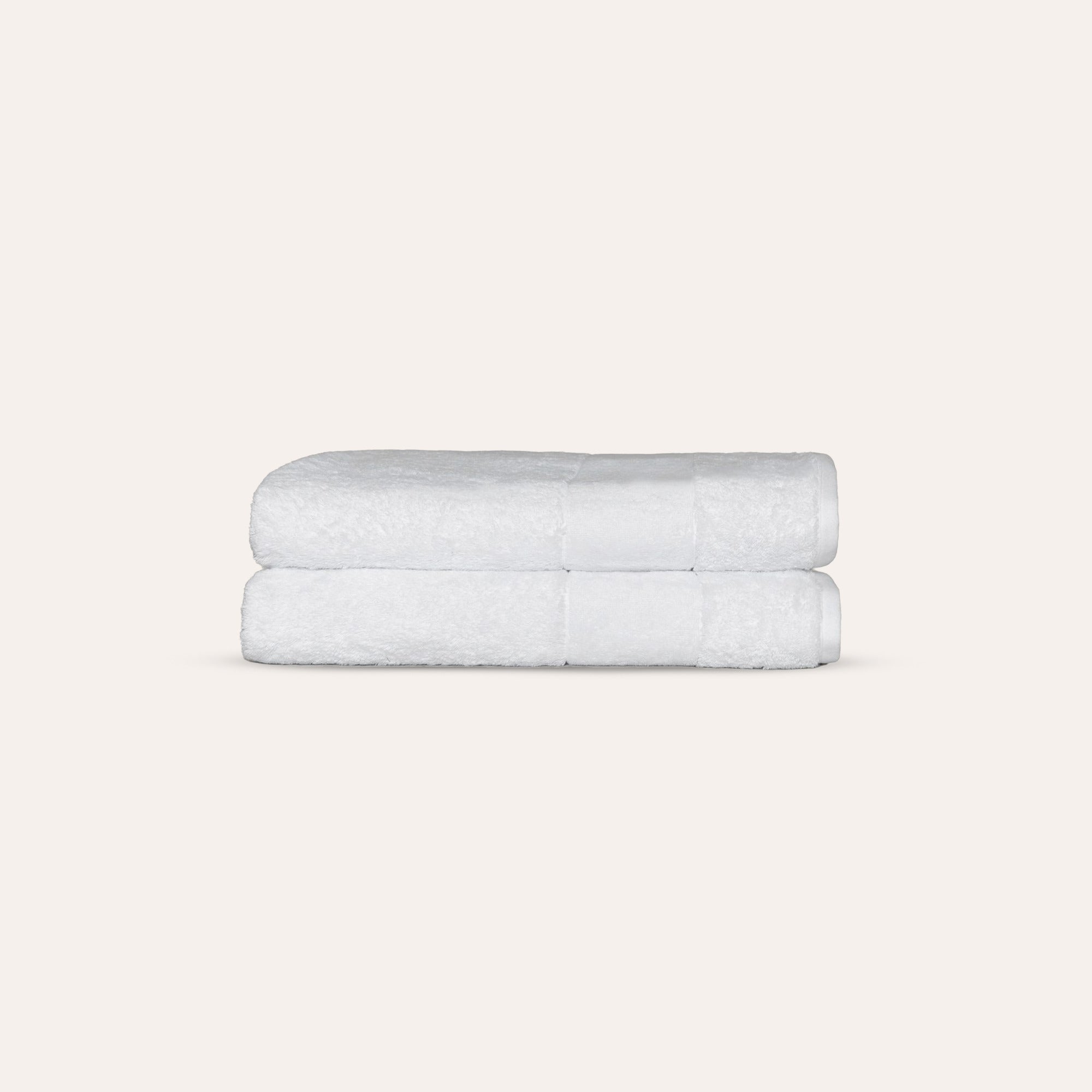 Ritual Bath Towels Pair by Rest & Reset folded in a lighter shade, showcasing softness and clean finishing