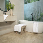 Ritual Bath Towels Pair by Rest & Reset styled as part of a complete bathroom setup for mindful daily routines