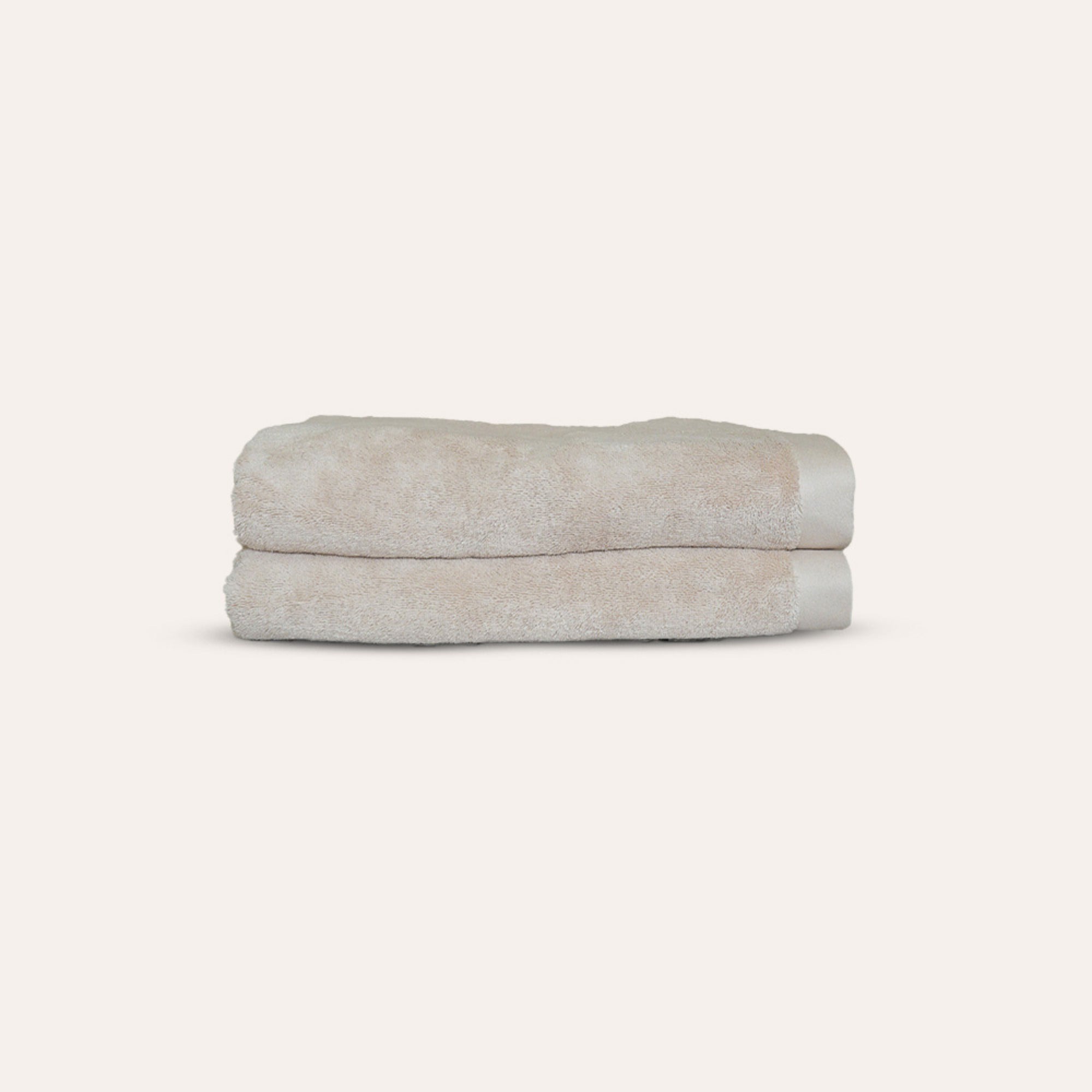 Oasis Bath Towels Pair by Rest & Reset neatly folded, highlighting plush organic cotton and minimalist design