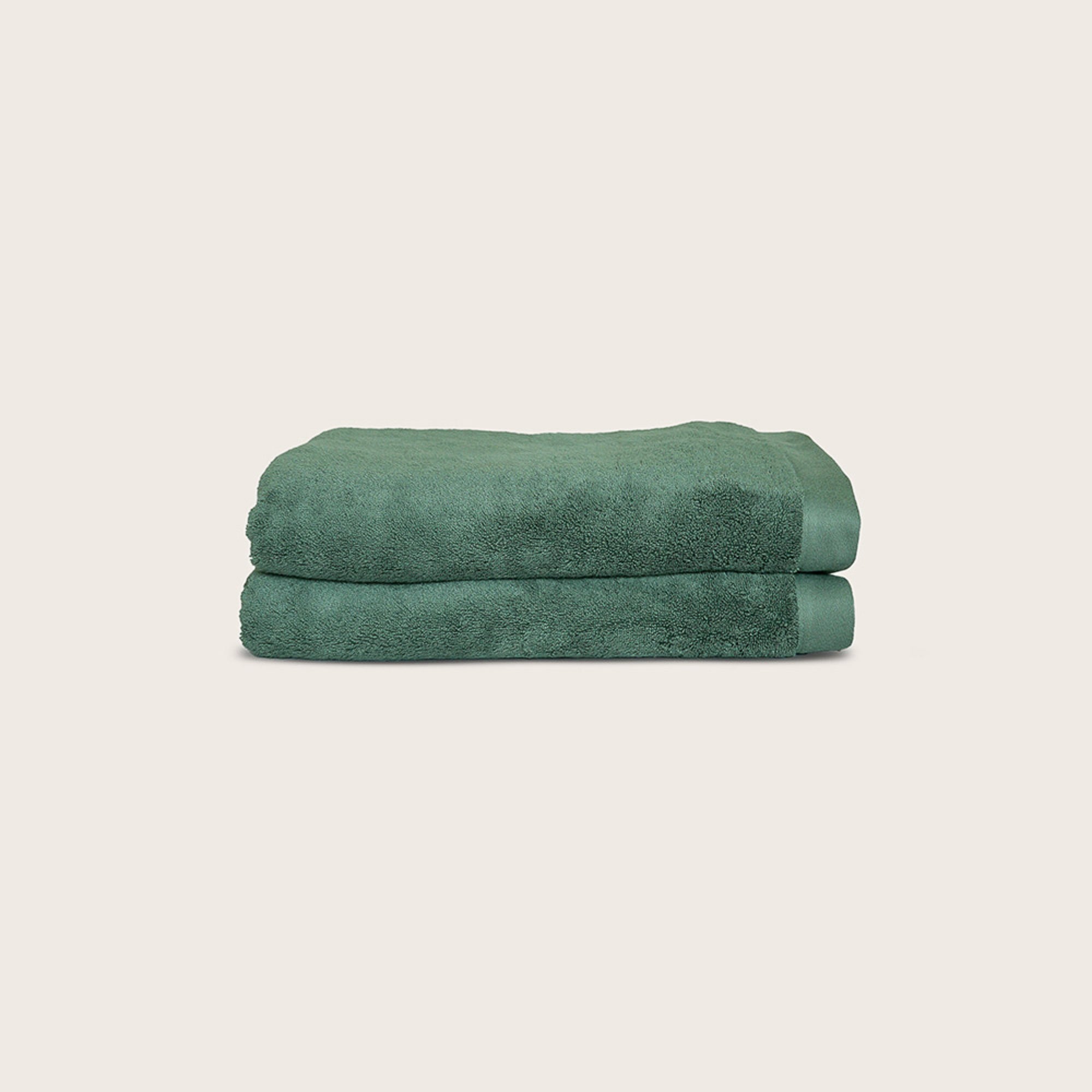 Oasis Bath Towels Pair by Rest & Reset shown folded in an alternate color, maintaining a clean modern aesthetic