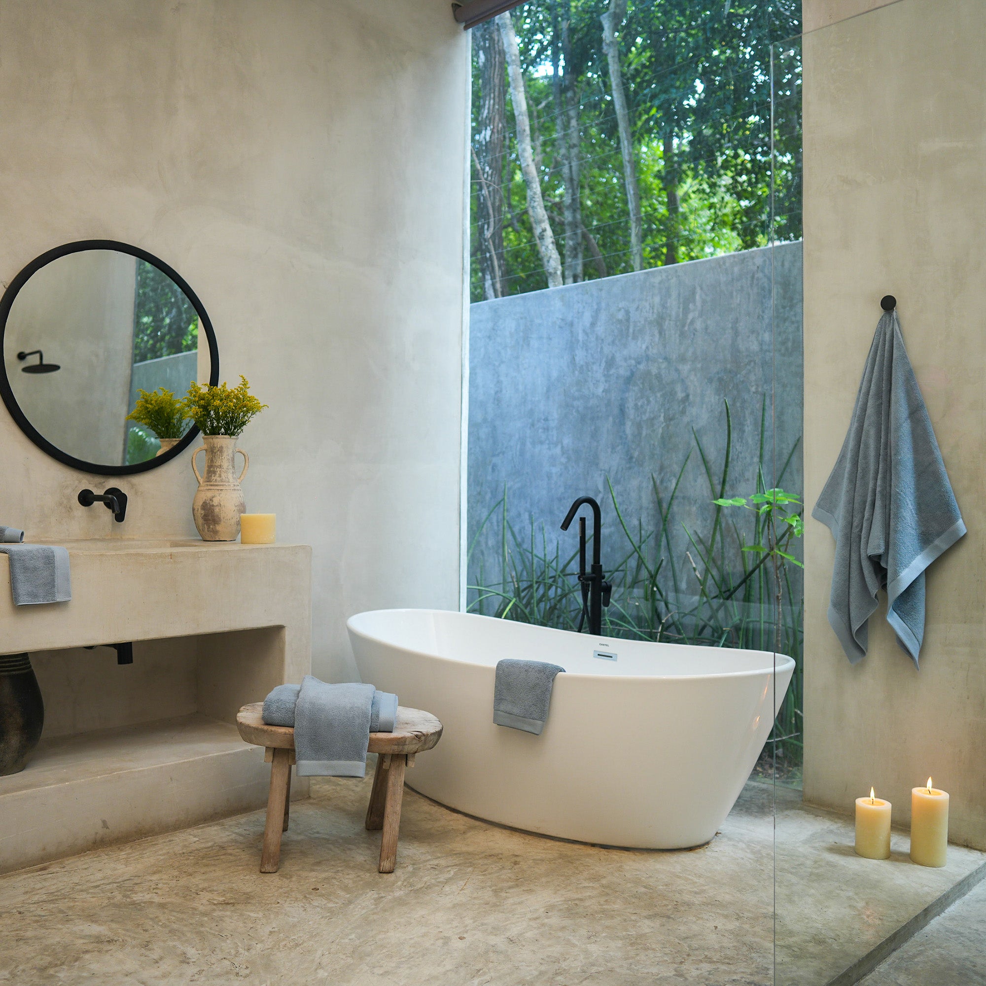 Oasis Bath Towels Pair by Rest & Reset styled in a serene bathroom, creating a calm and spa-inspired atmosphere