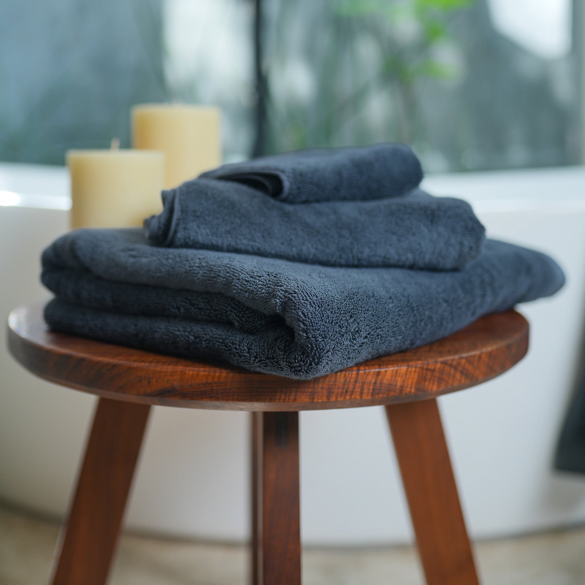 Oasis Bath Towels Pair by Rest & Reset folded in a lighter shade, showcasing softness and clean finishing