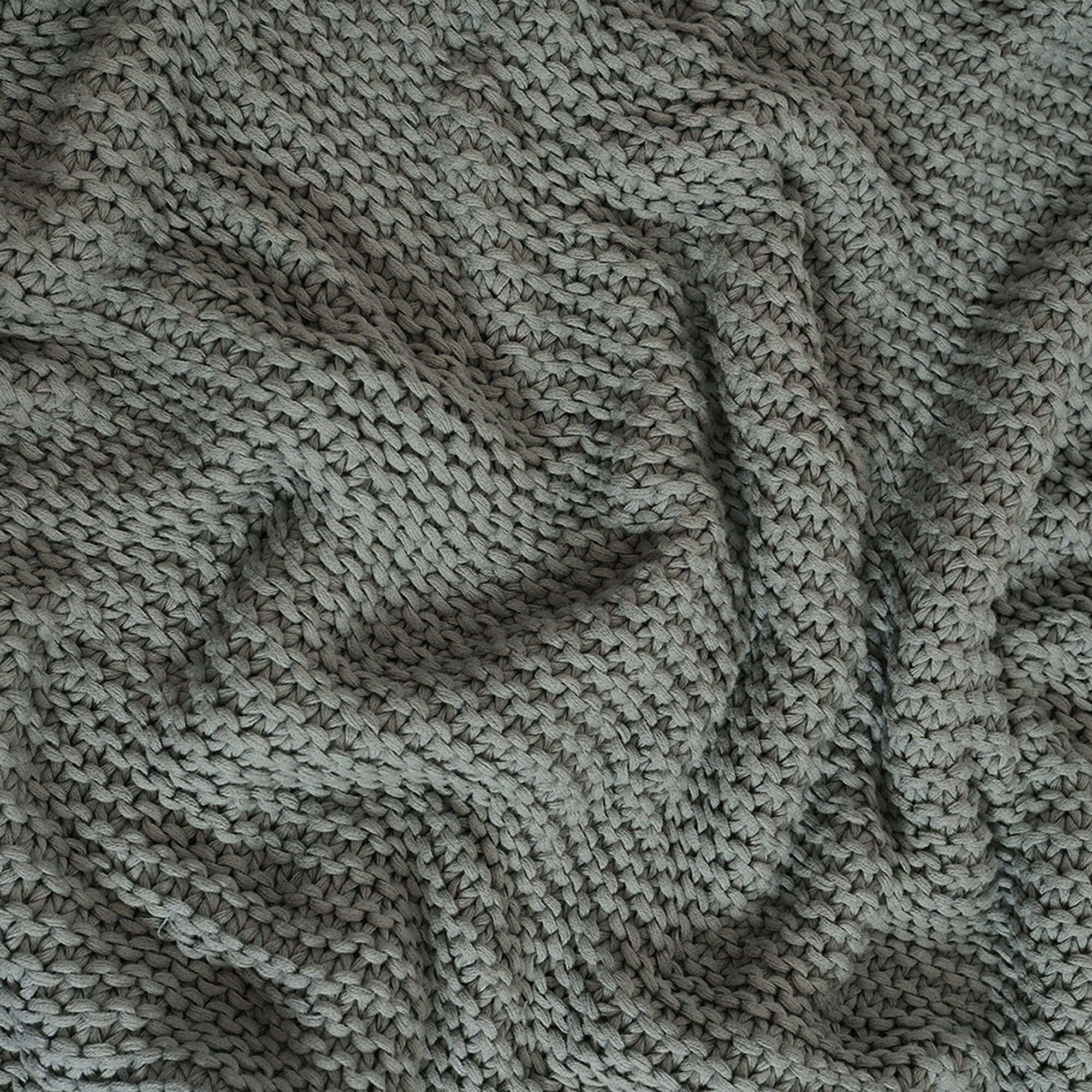 Close-up of organic cotton weave on Whisper Throw Blanket by Rest & Reset, highlighting softness and natural texture