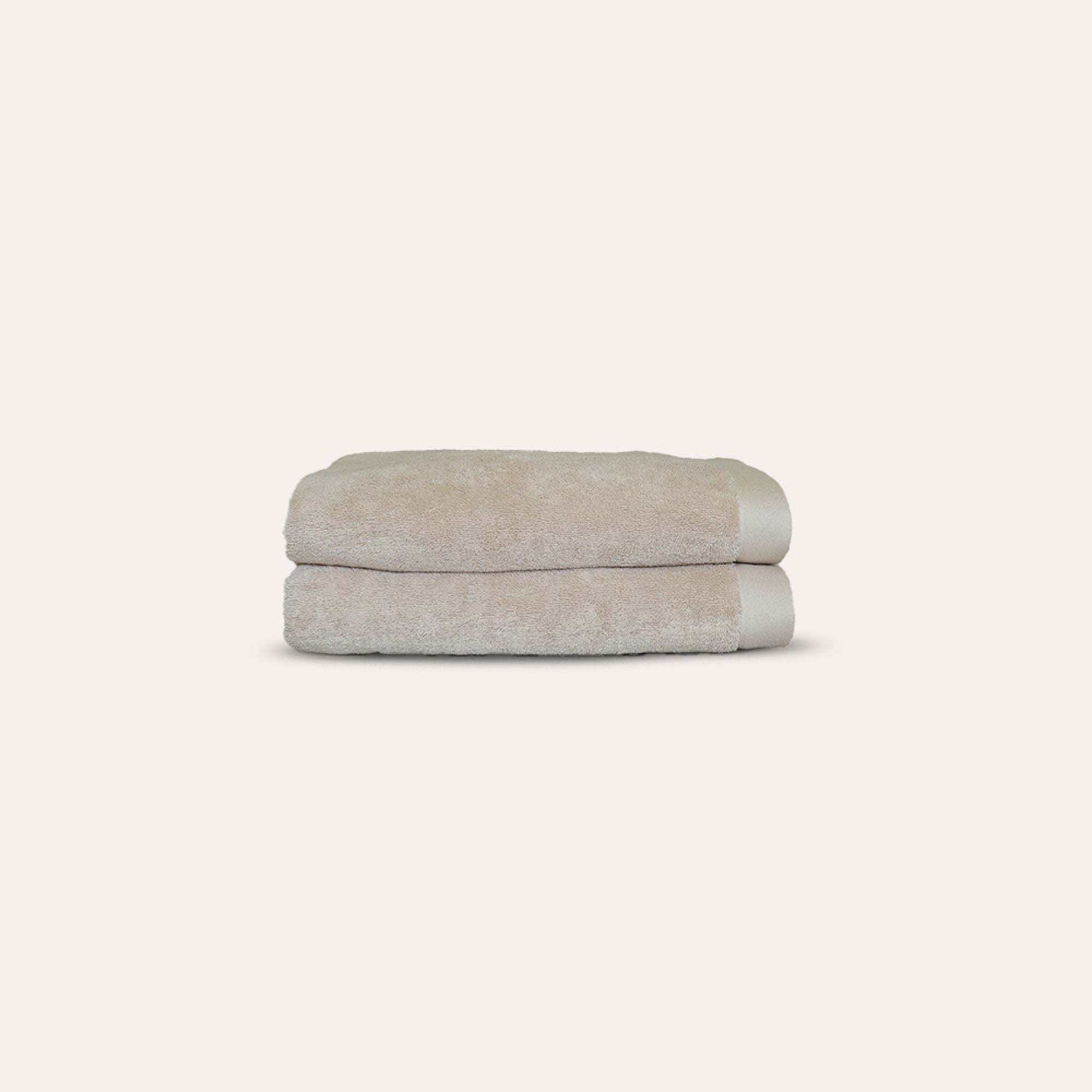 Oasis Hand Towels Pair by Rest & Reset neatly folded, showcasing plush organic cotton and minimalist design