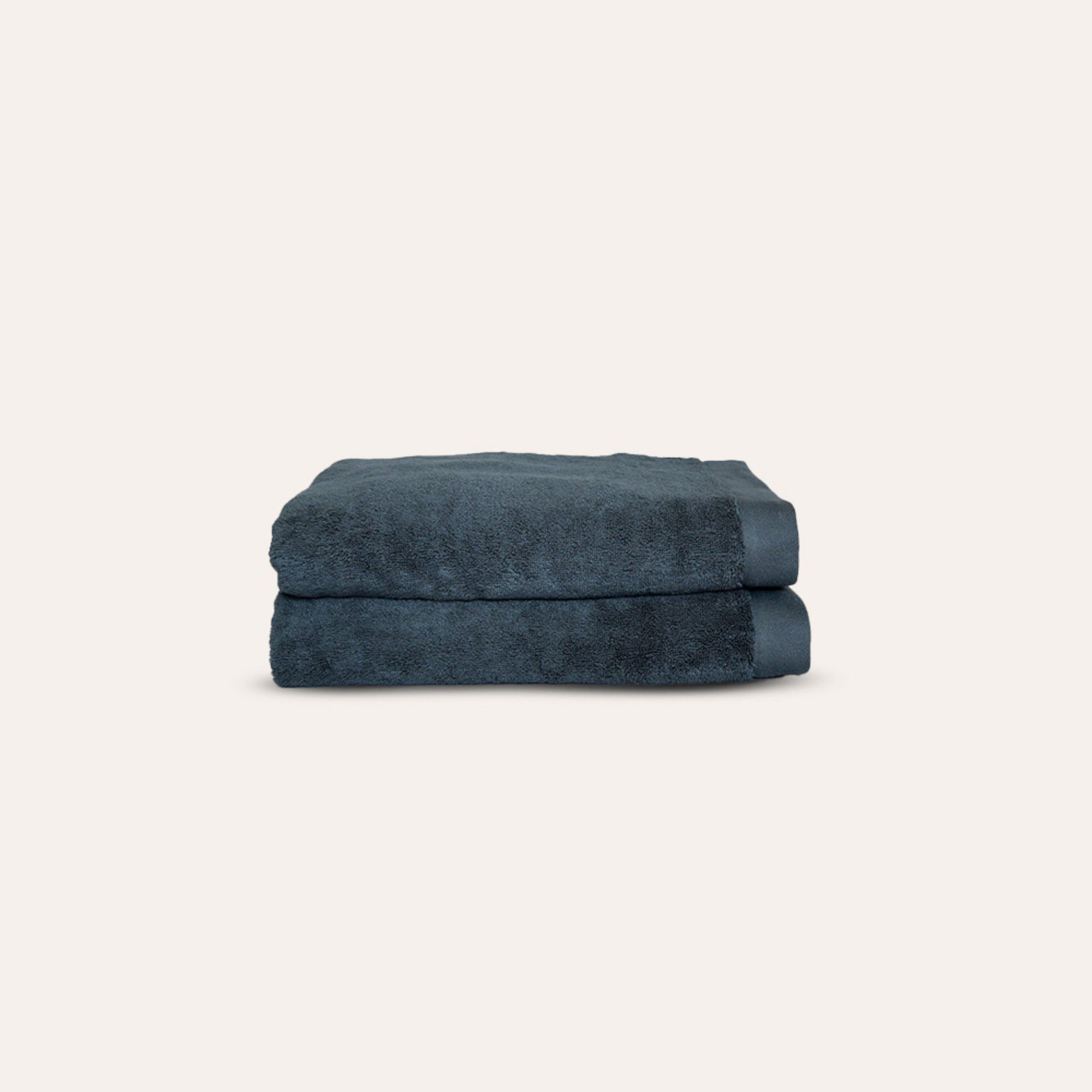Oasis Hand Towels Pair by Rest & Reset folded in a darker shade, highlighting plush organic cotton fabric