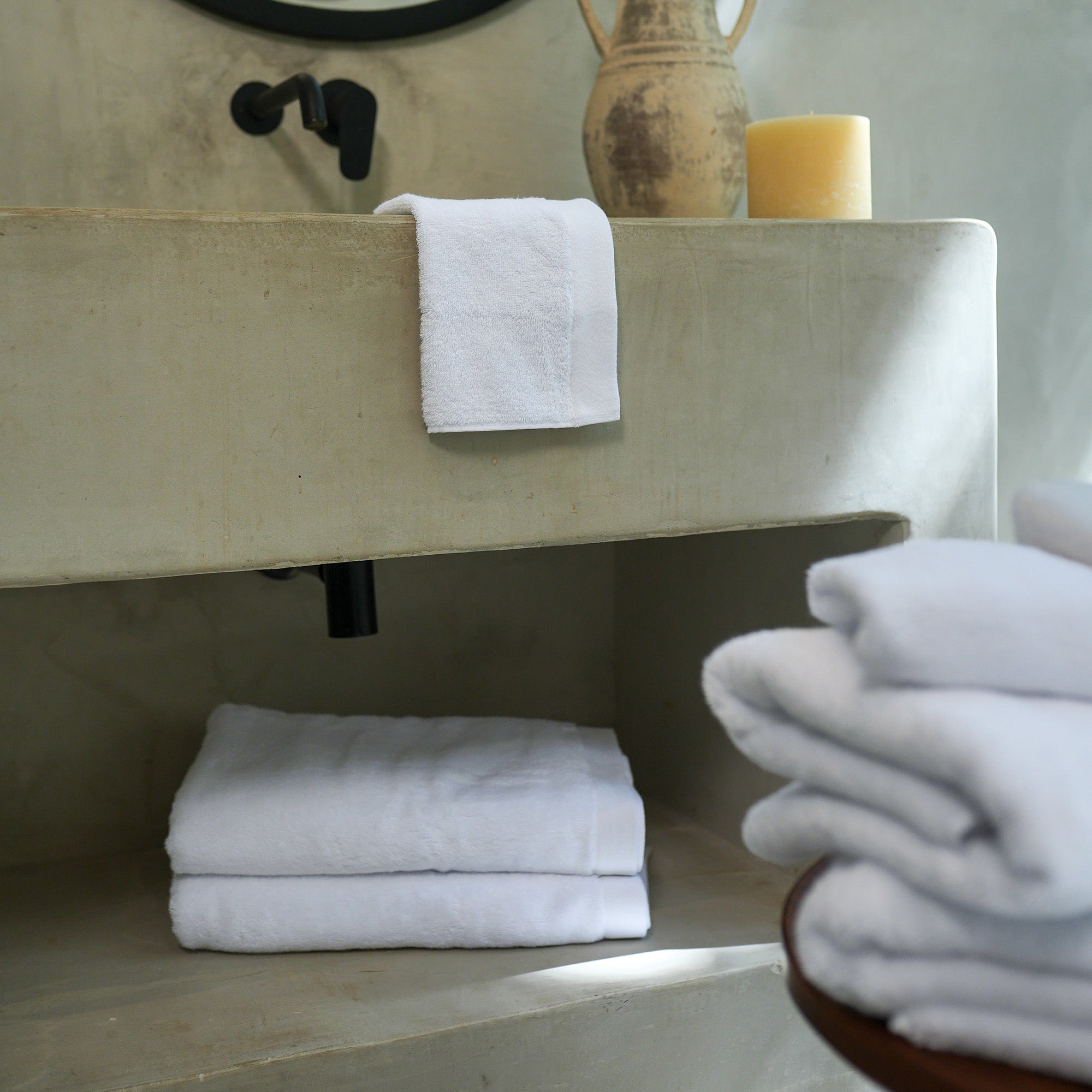 Oasis Hand Towels Pair by Rest & Reset styled near the sink and mirror, designed for convenience and daily use