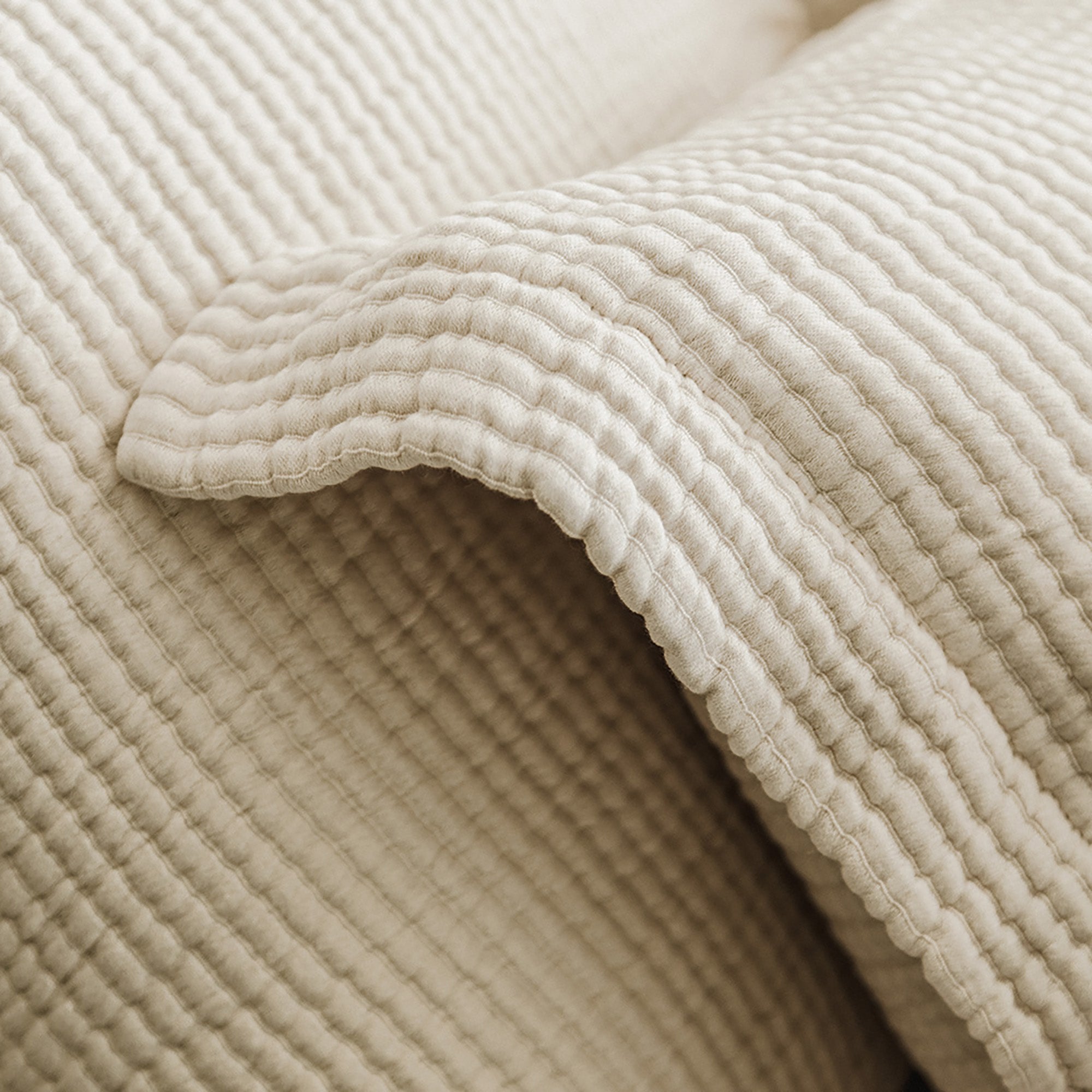 Close-up of organic cotton weave on Murmur Euro Sham by Rest &amp; Reset, emphasizing breathable and soft fabric