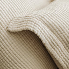 Close-up of organic cotton weave on Murmur Euro Sham by Rest & Reset, emphasizing breathable and soft fabric