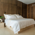 Murmur Quilt by Rest & Reset styled in natural light, enhancing texture and a relaxed bedroom aesthetic