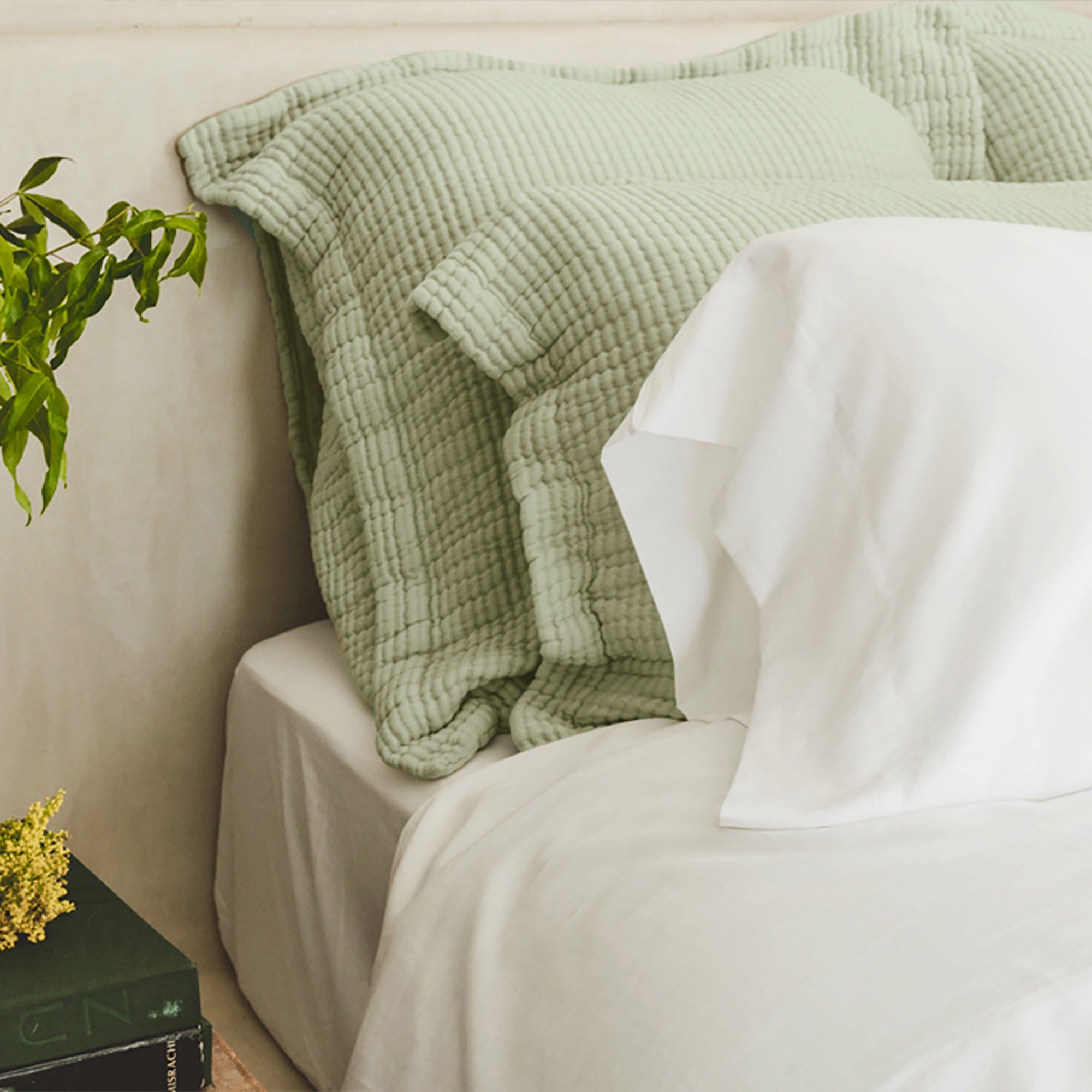 Murmur Euro Sham by Rest &amp; Reset styled with natural elements, enhancing a relaxed and organic bedroom aesthetic