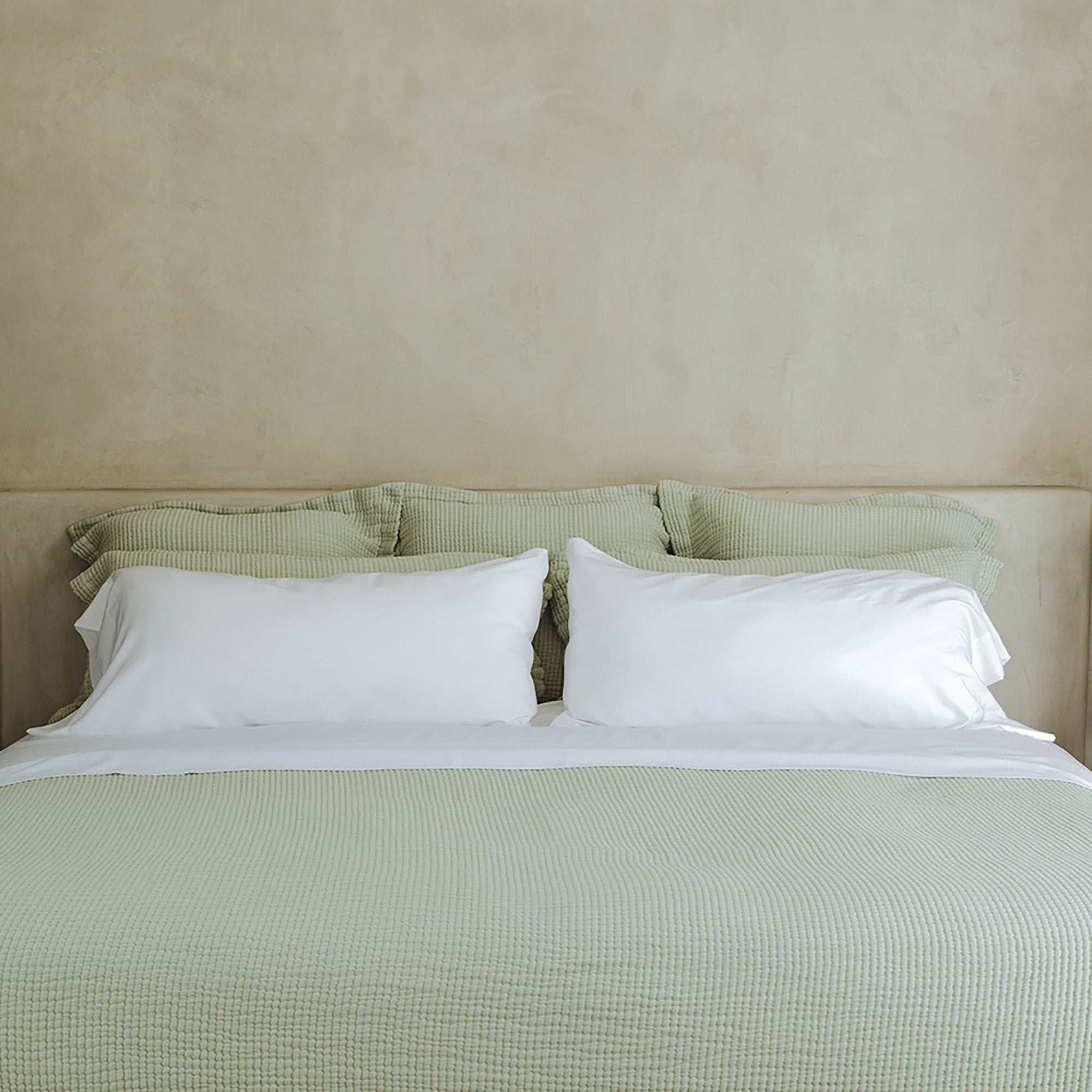 Murmur Pillow Sham by Rest & Reset styled across a full bed, designed for layered comfort and visual softness