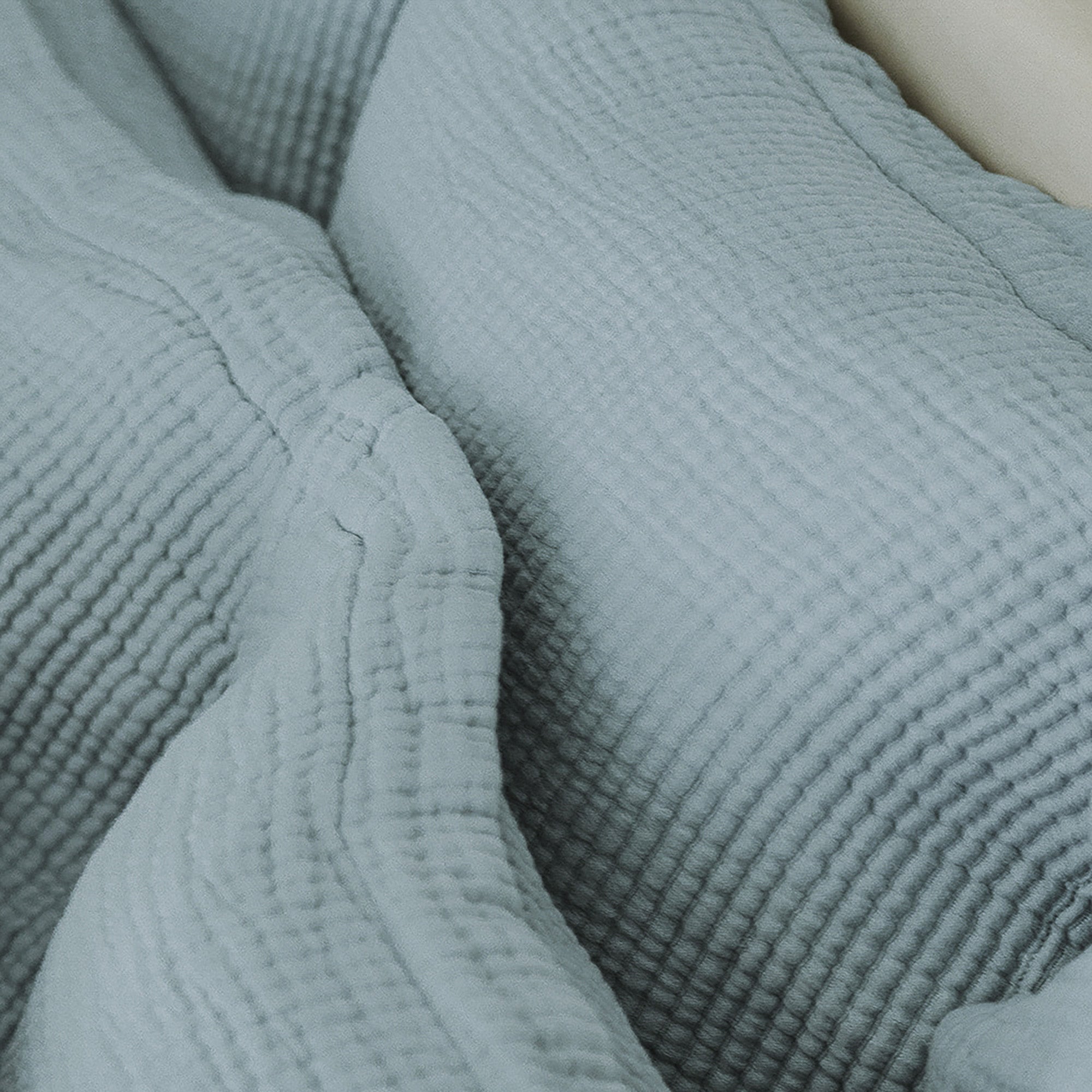 Close-up of organic cotton fabric on Murmur Euro Sham by Rest &amp; Reset, highlighting softness and natural texture