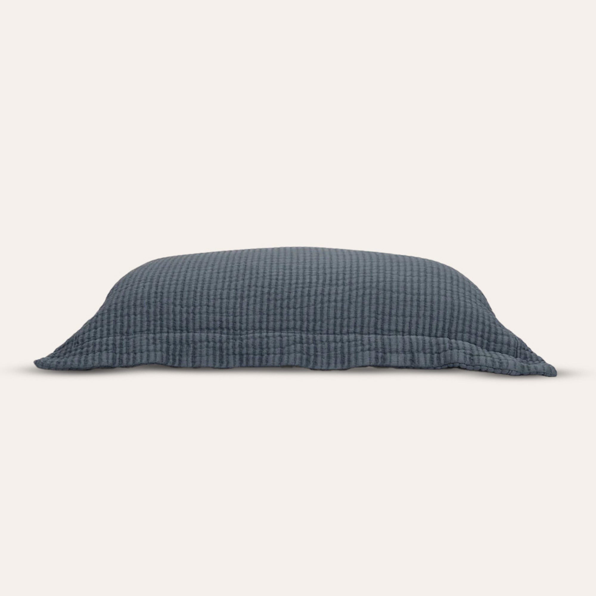Murmur Euro Sham by Rest &amp; Reset folded neatly, presenting premium organic cotton material