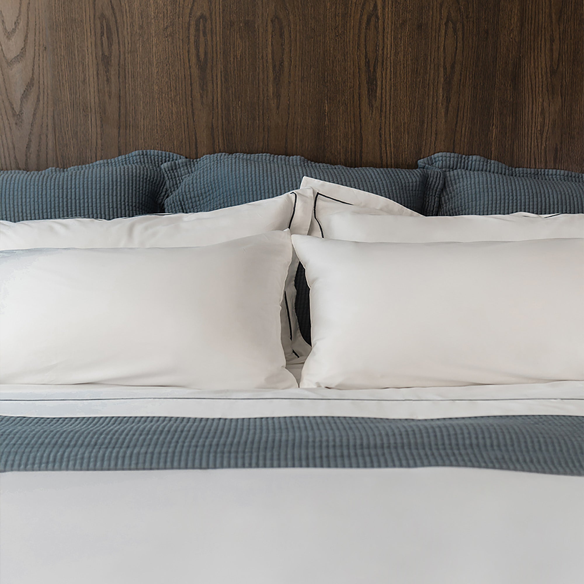 Murmur Euro Sham by Rest &amp; Reset styled on a light-toned bed, supporting a calm and airy sleep space