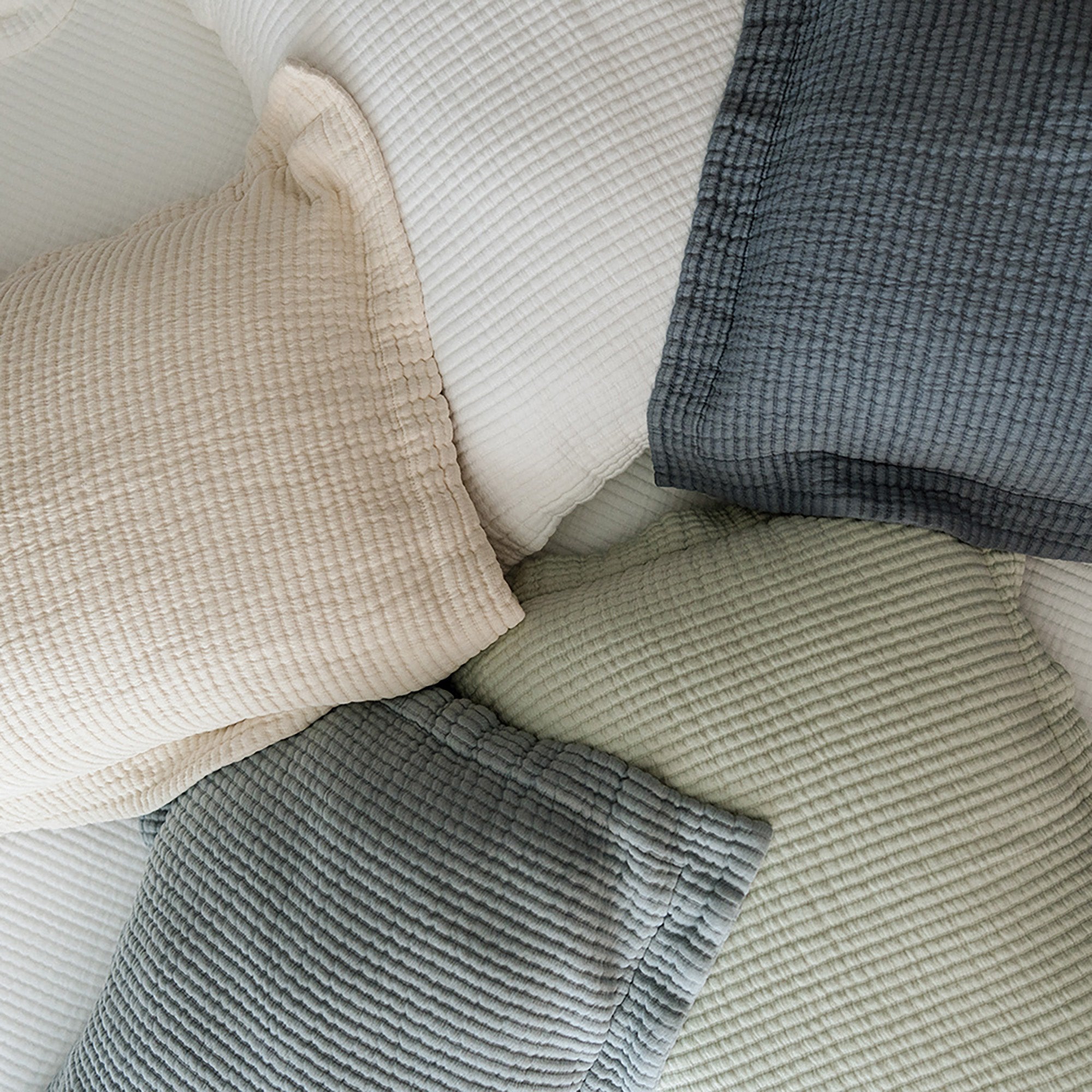 Murmur Pillow Sham by Rest & Reset layered with other bedding, designed for depth, softness, and comfort
