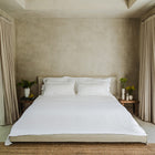 Murmur Quilt by Rest & Reset styled close to the mattress, highlighting softness and natural drape